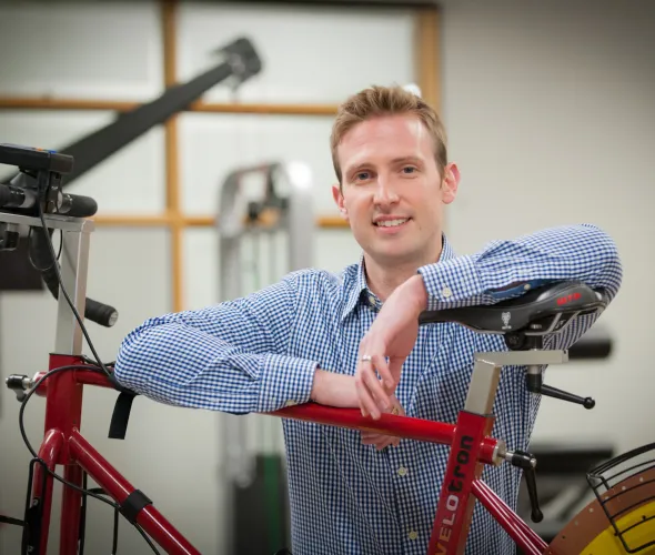 student and stationary bike