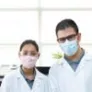 UPEI students Vidya Singh and Rabie Al Mialeh working in a laboratory