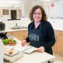 a dietitian in a commercial kitchen